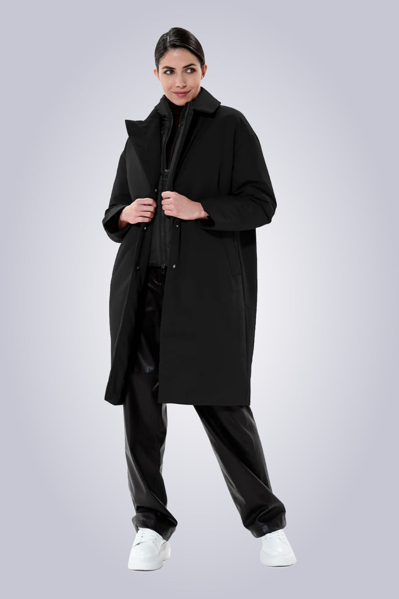 Duno Damen Mantel Glis in schwarz Duno Daunenmanzel Fully in schwarz. Damen Daunenmantel online kaufen Designer Mäntel Damen Daunenmantel schwarz kaufen Designer Mode Damen online bestellen Duno Damen Mode